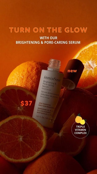 A high-contrast, ingredient-focused advertisement for a brightening serum, using vibrant citrus imagery to emphasize product efficacy.